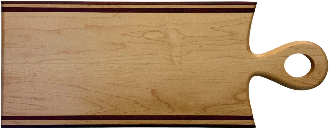Maple cutting board with a loop handle, used for the engraving preview