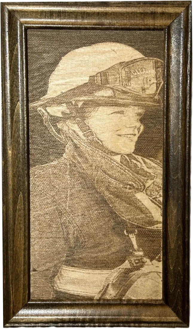 Laser-engraved portrait of a firefighter, framed